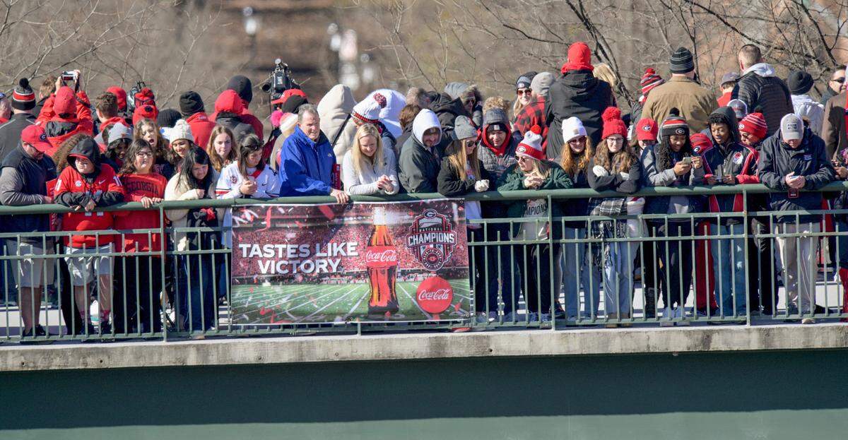 Georgia fans gather outside Sanford Stadium in Athens Saturday during the Bulldogs’ National Championship celebration.