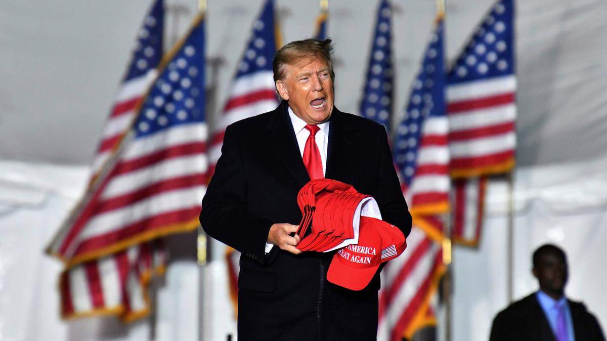 FILE - Former President Donald Trump enters the stage during a rally for Georgia Republican candidates in Commerce, Ga., on March 26, 2022. Trump is scheduled to appear Saturday, June 10, 2023, at the Georgia Republican Party’s annual convention in Columbus, Ga., two days after he announced he had been indicted for mishandling classified documents. (Hyosub Shin/Atlanta Journal-Constitution via AP, File)