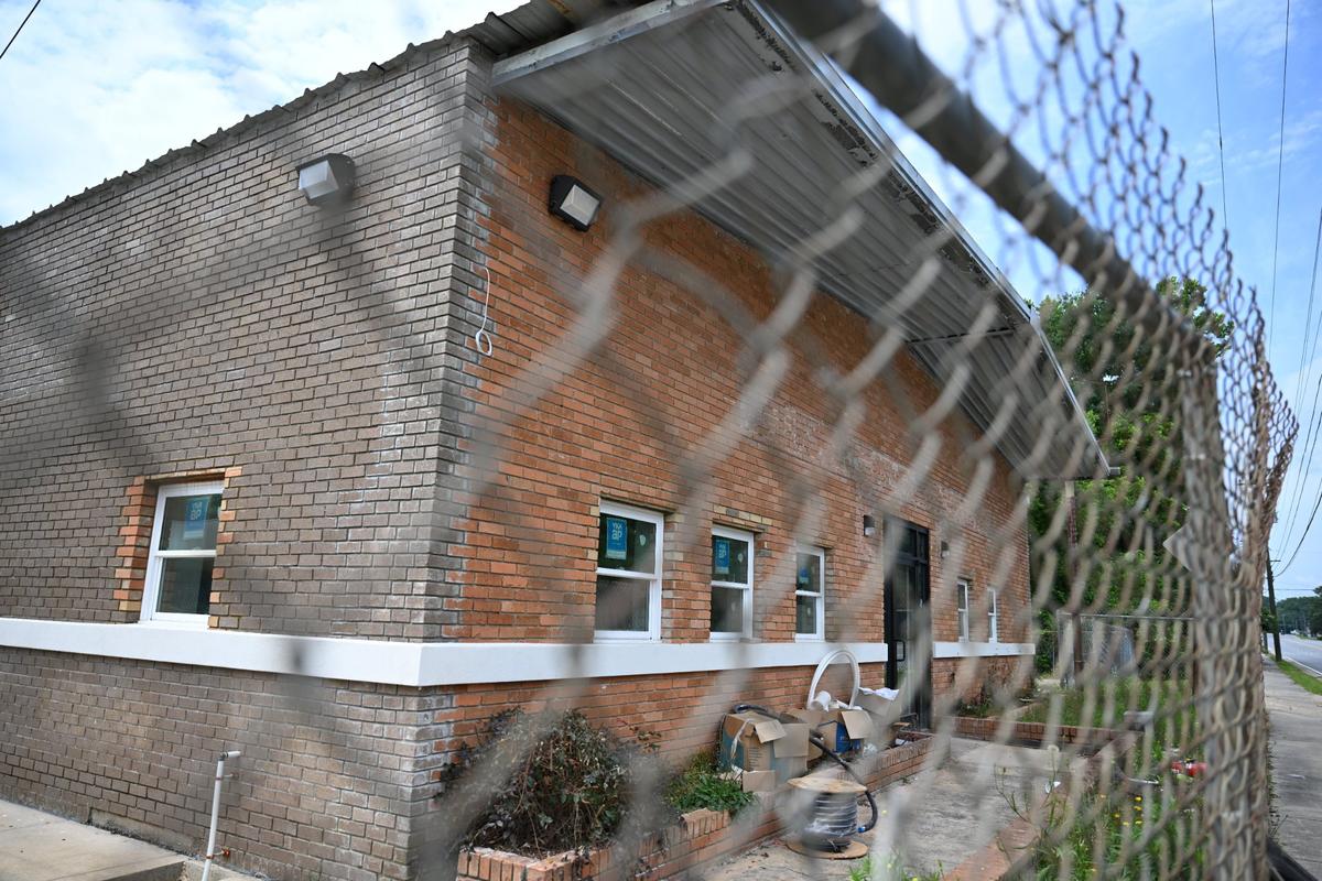 The under construction Haven Hope House sits behind a chain link fence on Monday, May 19, 2025, in Warner Robins, Georgia. The completion of the first city-run homeless shelter in Warner Robins has been delayed several times, but is set to open this summer.