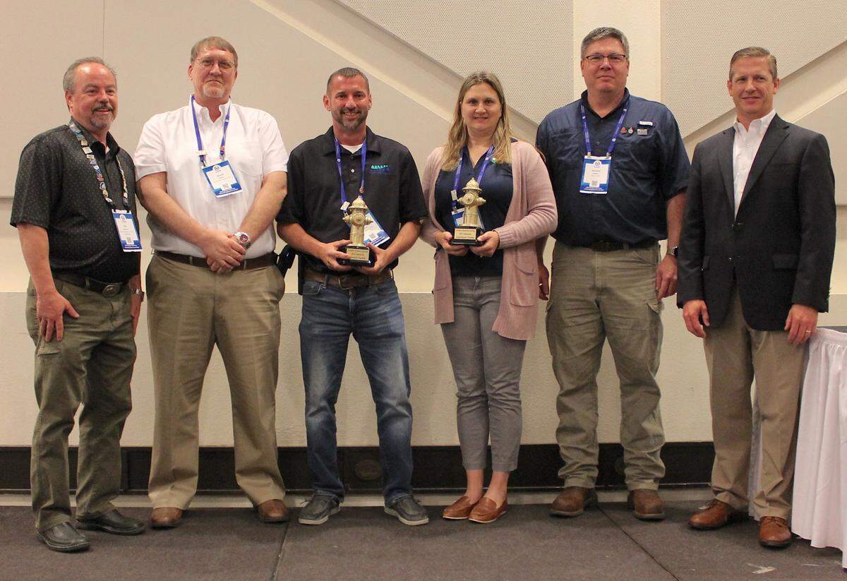 Macon Water Authority Professionals Chuck Mixon (second from left) and Daniel Smith (third from left) were honored at the Georgia Association of Water Professionals Spring Conference and inducted into the Golden Hydrant Society, which recognizes outstanding water professionals in Georgia.