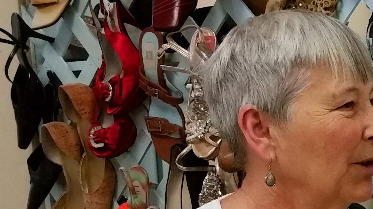 Director Judy Sexton and volunteer Debbie Mason of Loaves and Fishes Ministry of Macon are pictured in the store-style area of the ministry where clothes are given away without charge.