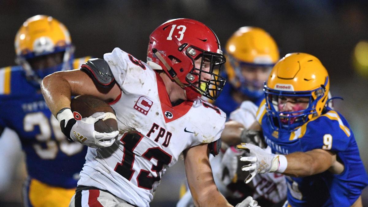 DONN RODENROTH,Macon, Georgia, 10/08/2021: FPD’s Coleman Cauley swings around the edge Friday night in action against Tattnall Square Academy.