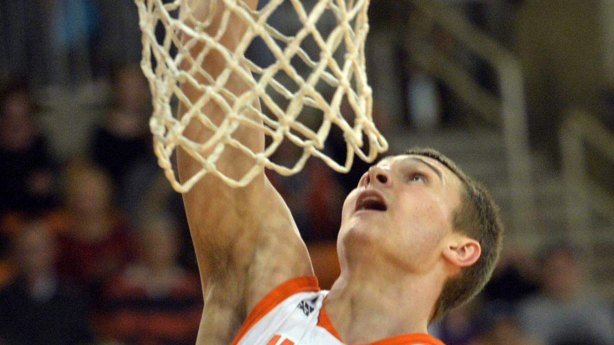 Mercer's Ethan Stair goes up for a dunk against The Citadel on Saturday.