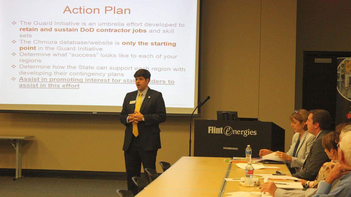 Brett Lacy of the Georgia Department of Economic Development talks to regional economic development leaders Tuesday about the state's initiative to boost the military contracting industry in Georgia.