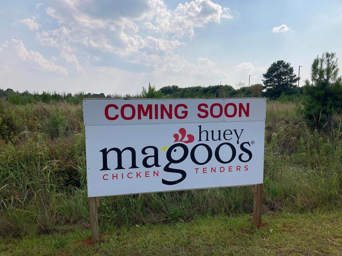 A sign marks the spot in a vacant field for this new chicken tenders restaurant coming to Perry just east of McDonald’s in the Publix shopping center off the Perry Parkway.