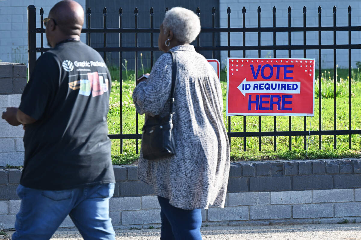 Voters walk into the Thompson Complex to cast their ballot in the Georgia primary election on Election Day on Tuesday, May 19, 2026, in Macon, Georgia. Polls in Middle Georgia are open from 7 a.m. until 7 p.m. this evening.