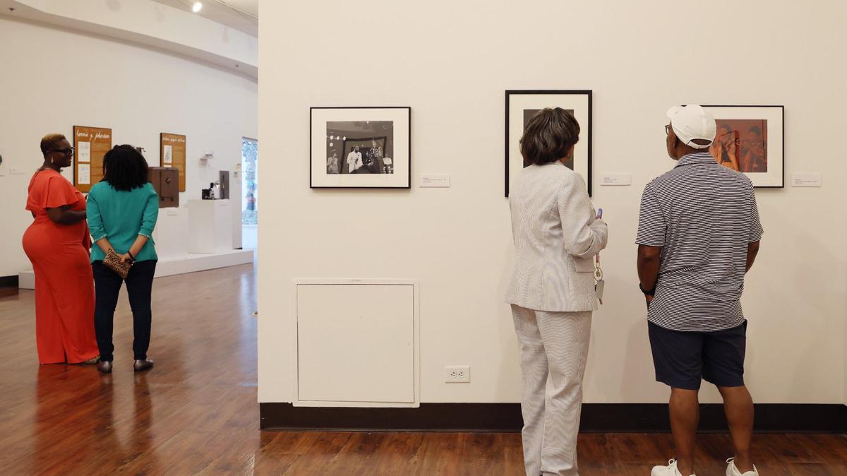 Attendees walk through the exhibit at the opening reception for “Thrillers: Black Music in Atlanta 1960s-1990s” on Sunday, July 28, 2024, at the Tubman Museum in Macon, Georgia. Go Vote Georgia will hold an early voting rally at the museum Saturday, Oct. 26, 2024.