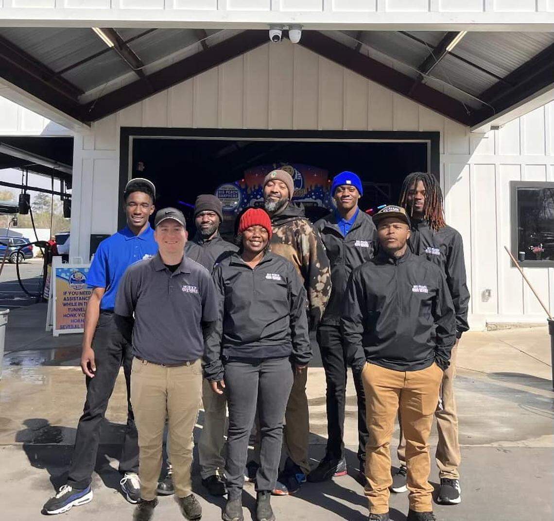 Part of the employee team at Big Peach at Fountain, which has set its April opening date.