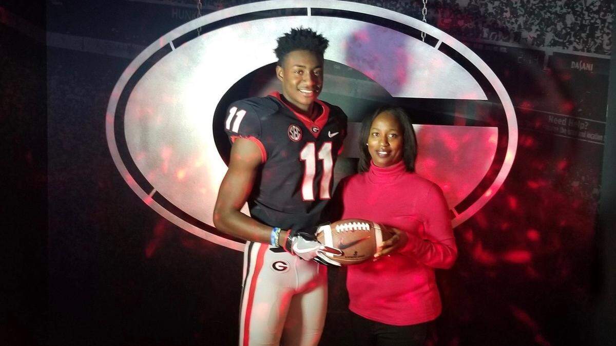 Tommy Bush poses for a photo with his mother, Annie Bush.