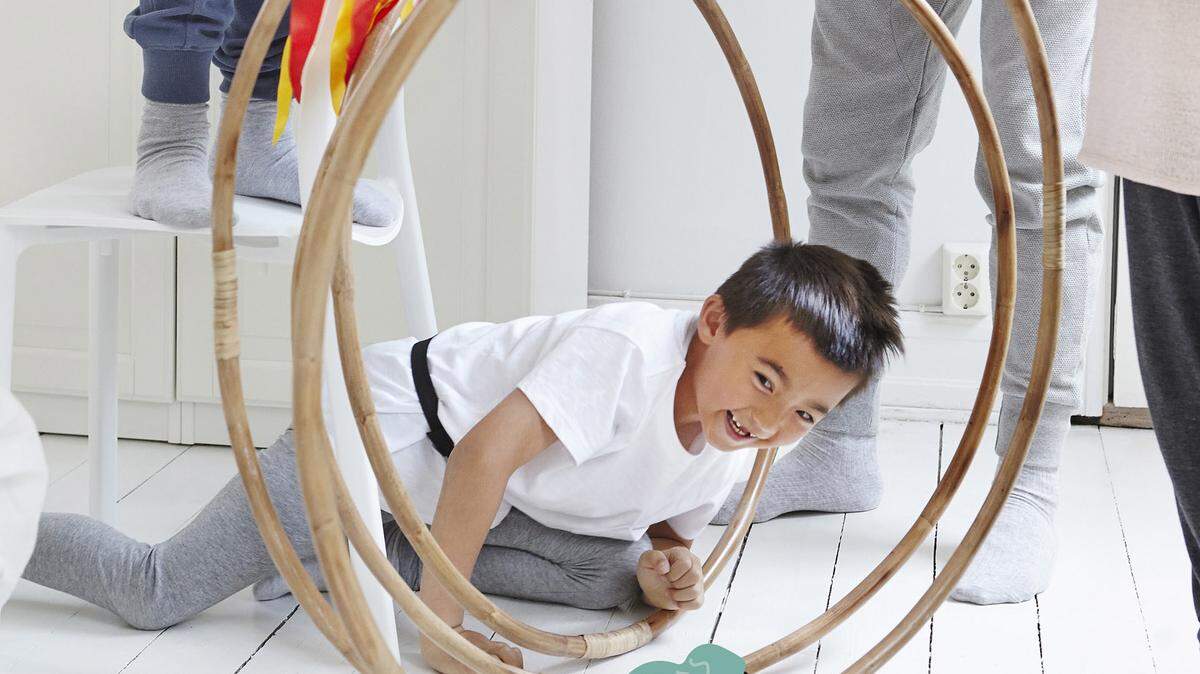 Ikea just introduced its Lattjo collection of toys and games designed to bring adults and kids together for the interpretive dance equivalent of play. Don't expect detailed instruction manuals with some of these objects, the idea is to unleash creativity and encourage quirkiness, as with elastic ribbons ($2.99 each) that you can string between chairs to create an obstacle course for kids and adults to crawl through. There are clearer-cut options such as numbered bands you can wrap around water bottles for indoor bowling ($2.99 for 10), domino games ($12.99 each) and puzzle globes ($7.99). But to free your mind, don an oddball ìbrain hatî ($9.99), queen collar ($9.99), pair of paws ($6.99) or other role-escape costume accessories.
