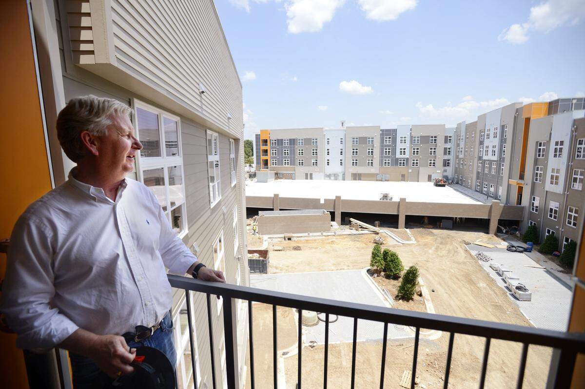 Jim Daws, president of Sierra Development overlooking the Lofts at College Hill.