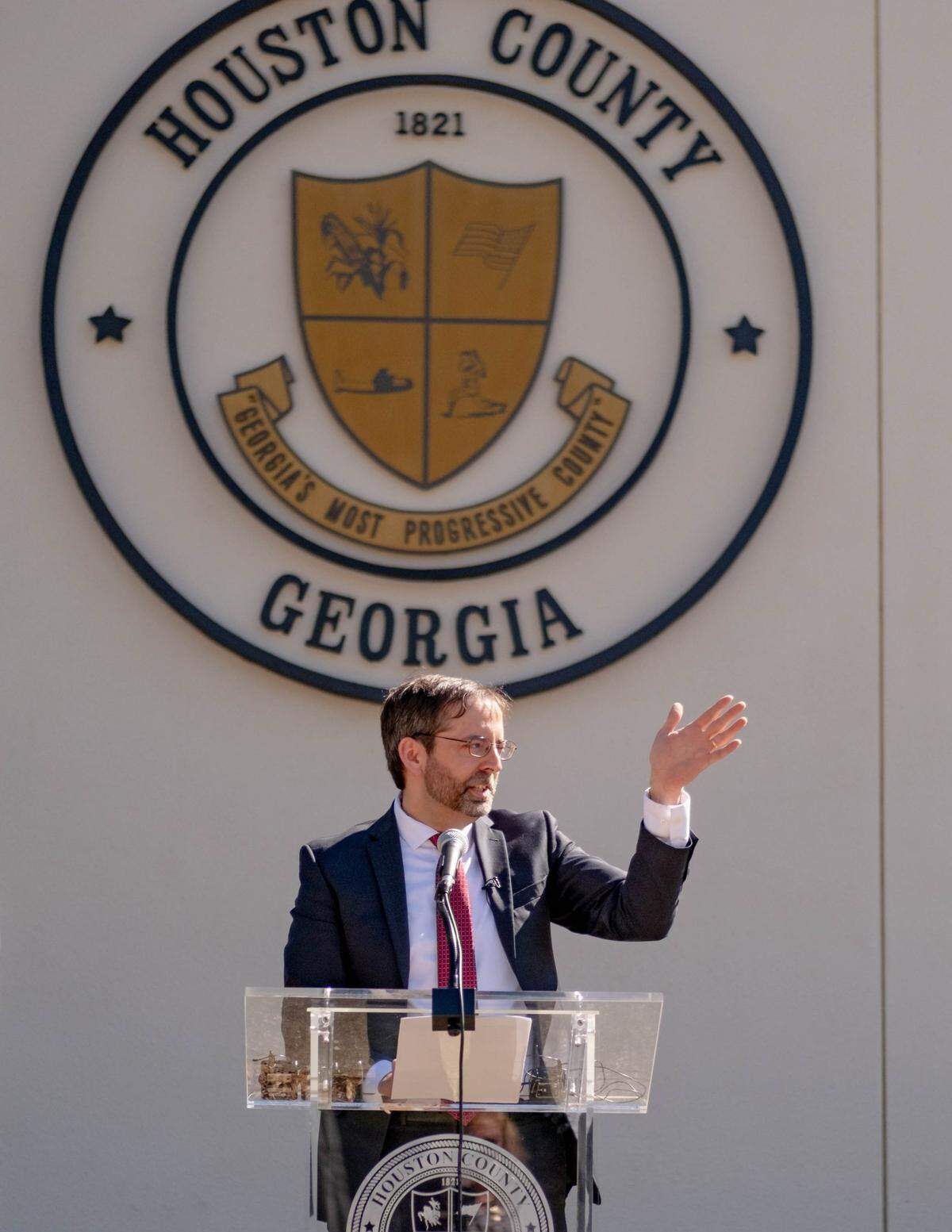 Houston County Commissioner Shane Gottwals, who also owns Gottwals Books, speaks to the crowd during a gathering.