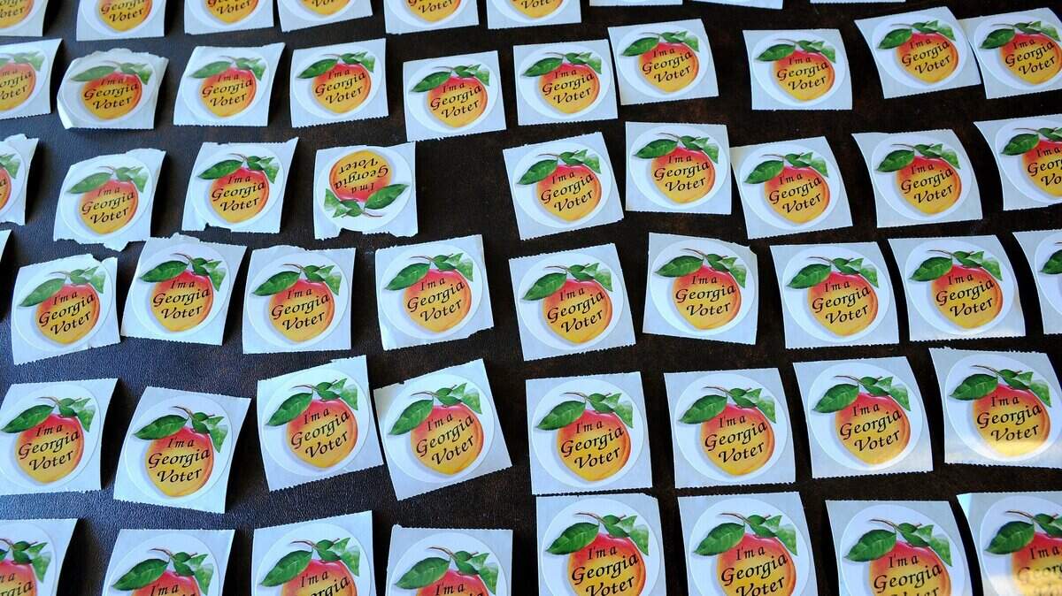 Georgia voter stickers pictured at the Bibb County Board of Elections in 2013.