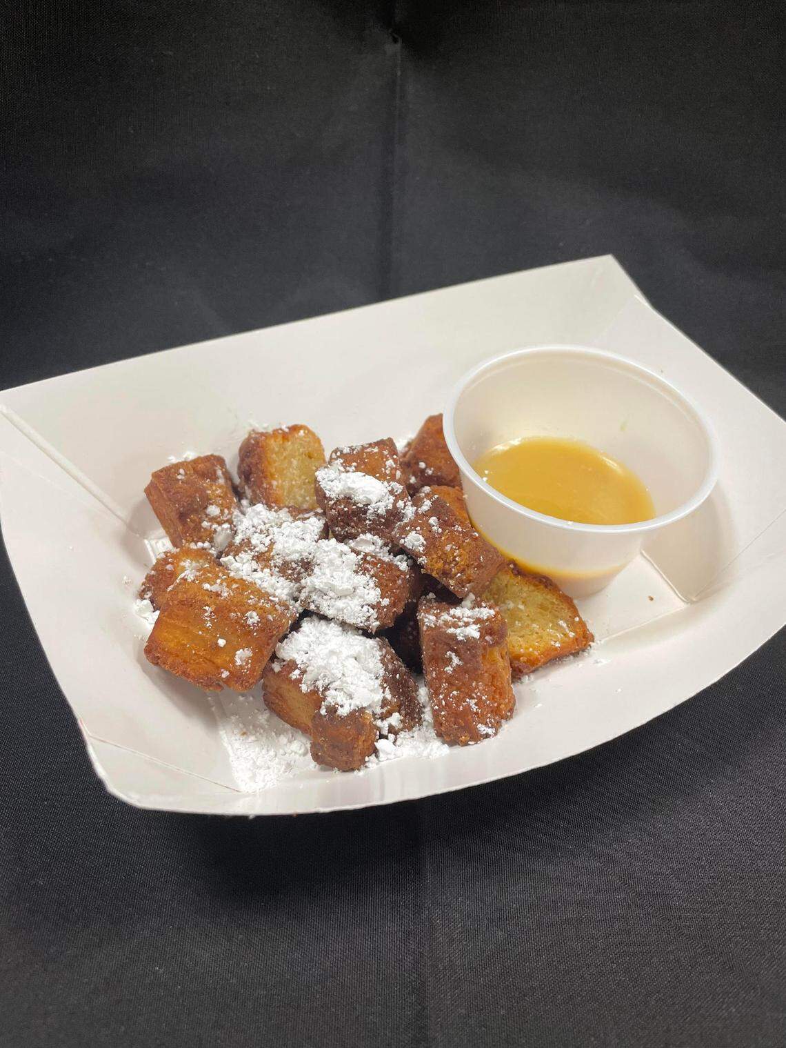 Fried bread pudding with caramel sauce from the new Root 76 Cuisine food truck.