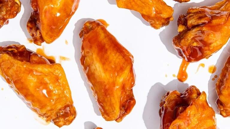 A popular chicken wing franchise opens its 1st location in Perry. Take a look inside