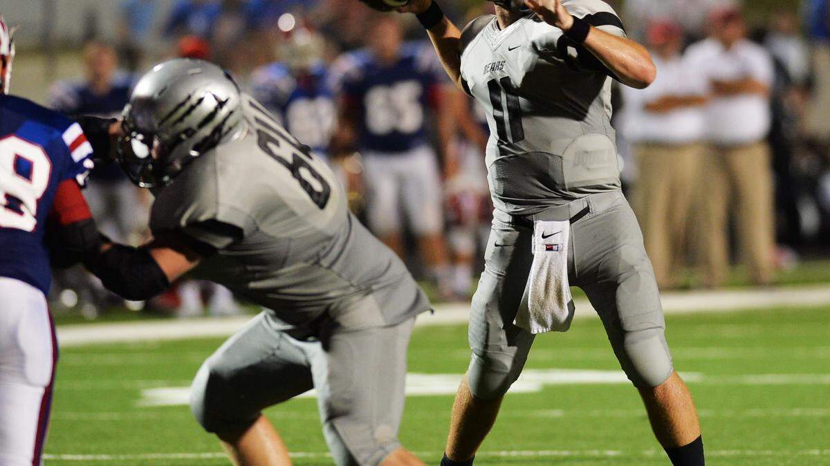Houston County quarterback Jake Fromm got plenty of protection as he sets to throw toward the end zone at the end of the first half.