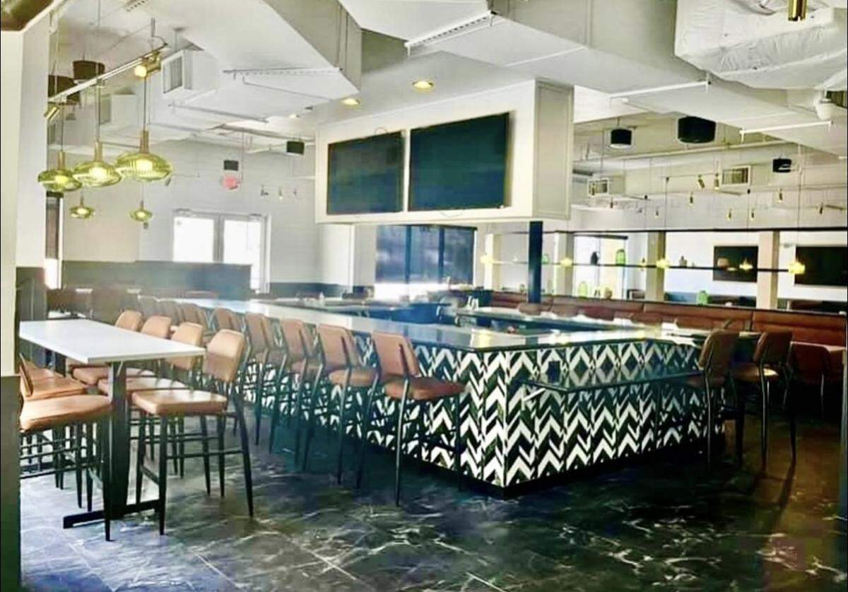 Toasted Kitchen & Cocktails in Macon offers elevated dining and fun cocktails with a 1920s cigar lounge feel.