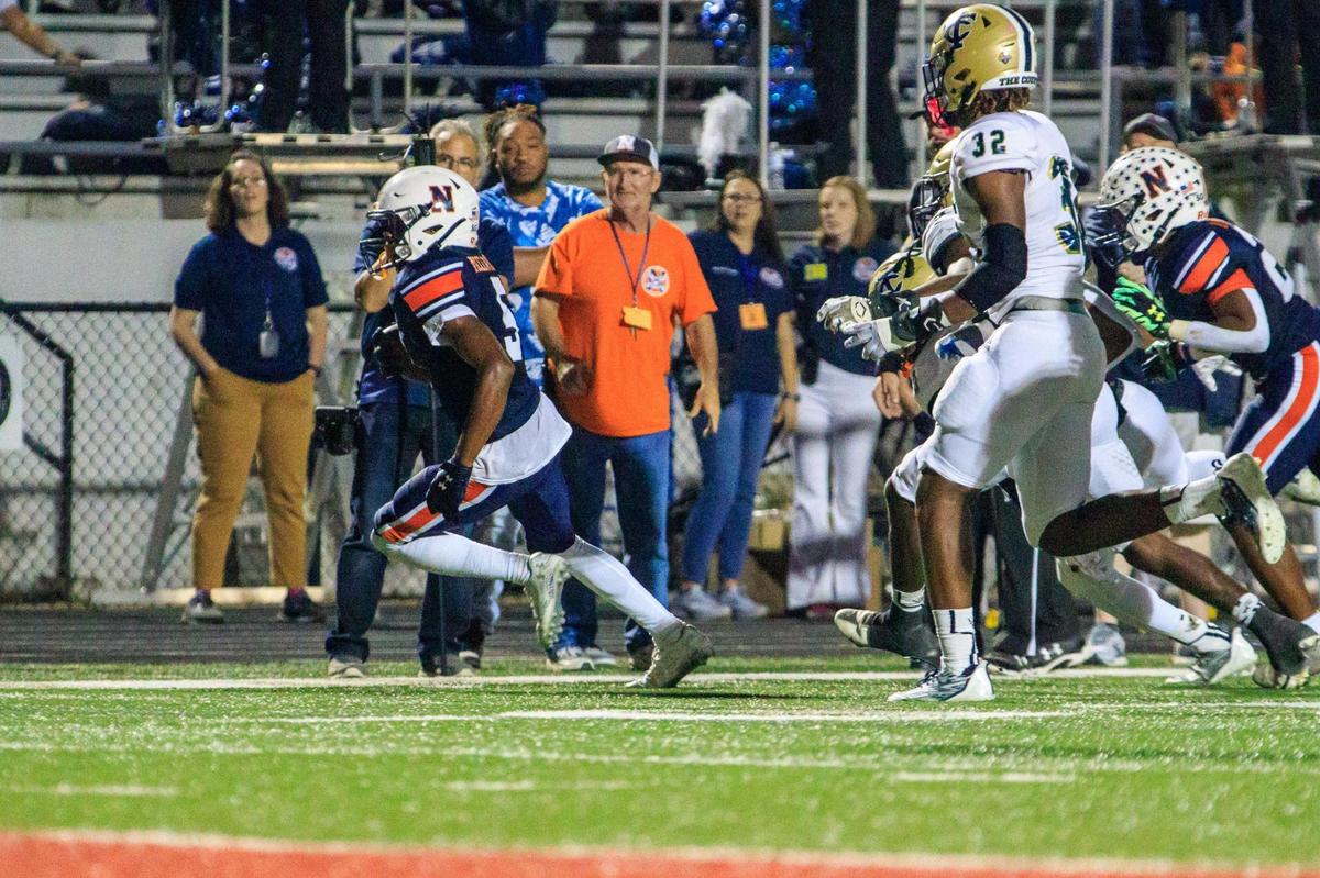 CLAY TEAGUE/FOR THE TELEGRAPH Warner Robins, GA, 11/4/22 Northside’s Duke McClinton tiptoes down the sideline to score against Thomas County Central.