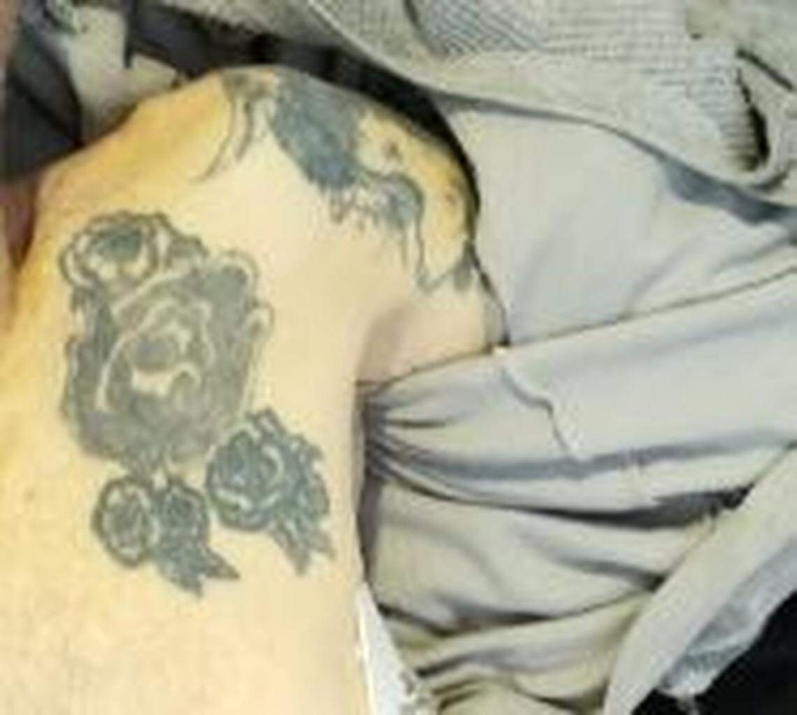 A unidentified white man believed to be in his 50s has tattoos on his left chest and shoulder that could help identify him. He was hit by a car and killed on Pio Nono Avenue in Macon early Monday morning.