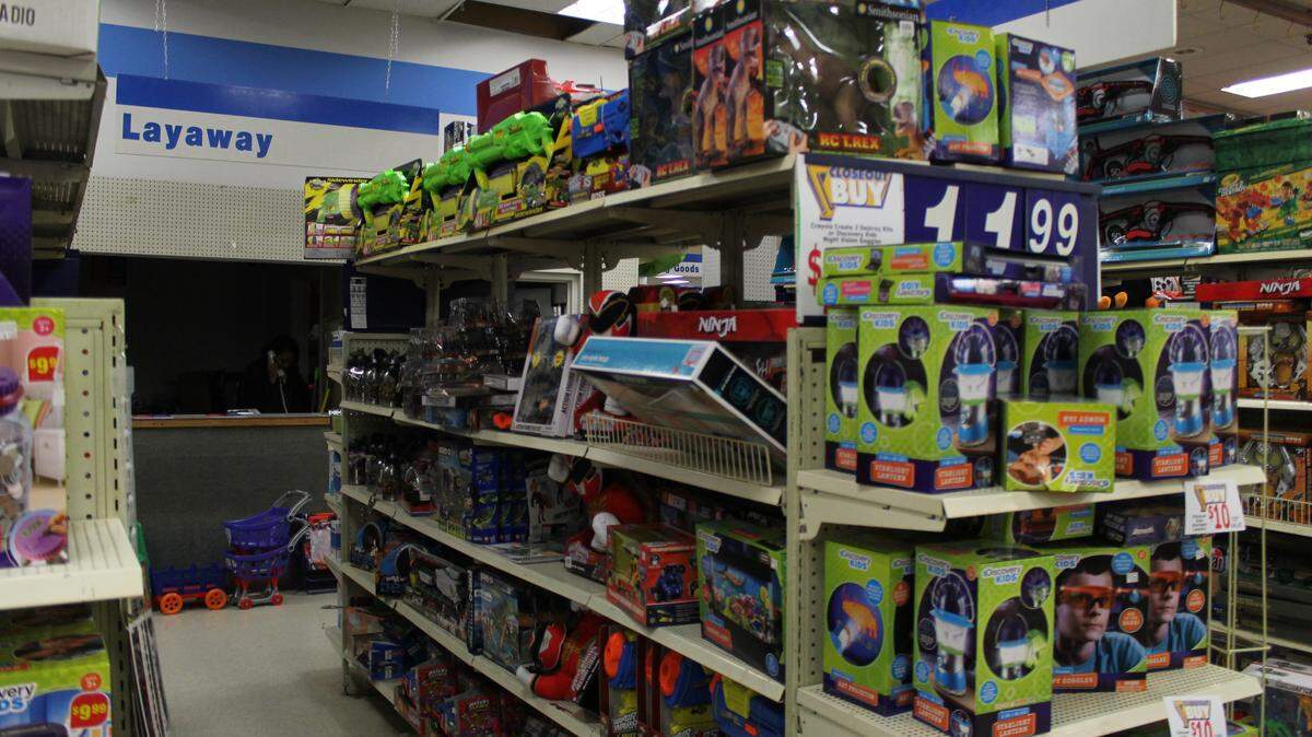 Toys on layaway are piled up at the Rose's discount store on Shurling Drive in Macon.