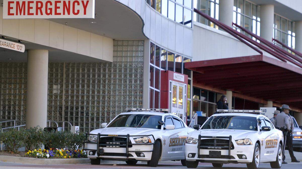 Bibb County sheriff vehicles are parked out front of the Medical Center, Navicent Health, emergency room in this file photo.