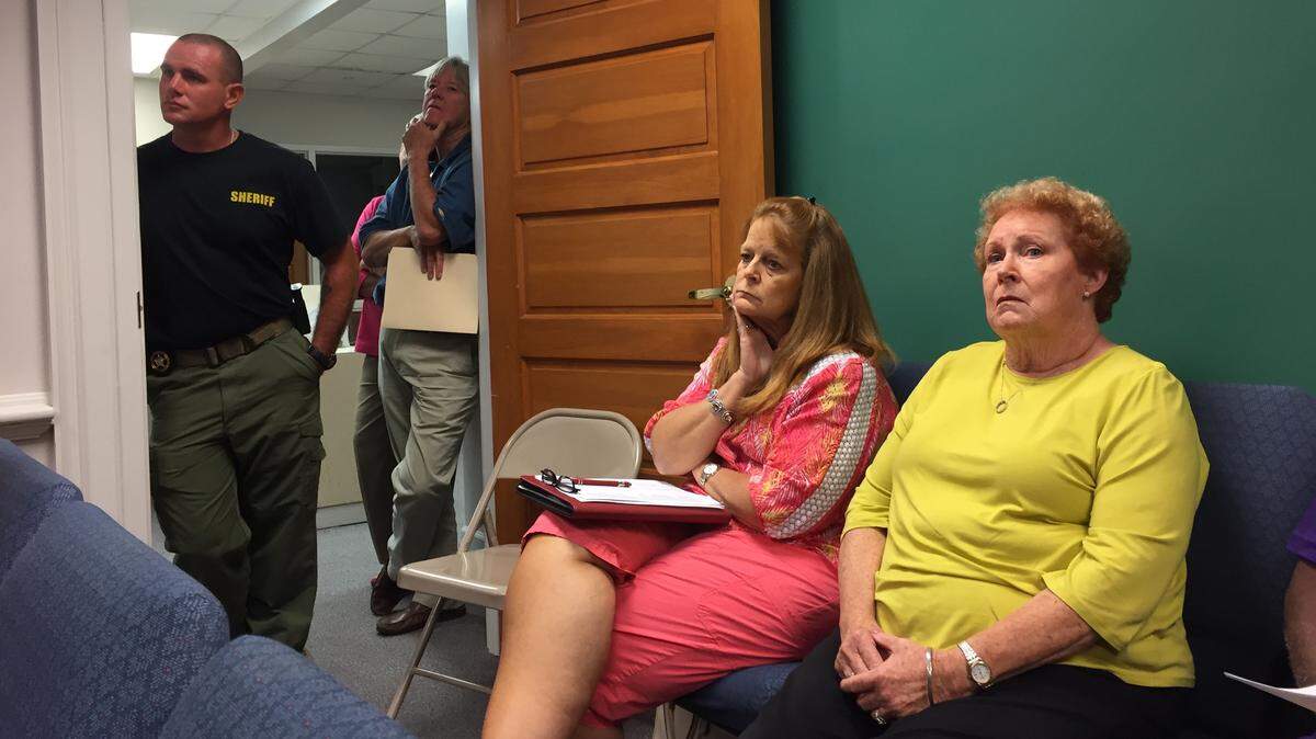 The Twiggs County Board of Commissioners meeting was standing room only on Tuesday night as county employees awaited the board’s vote on a new health insurance plan.