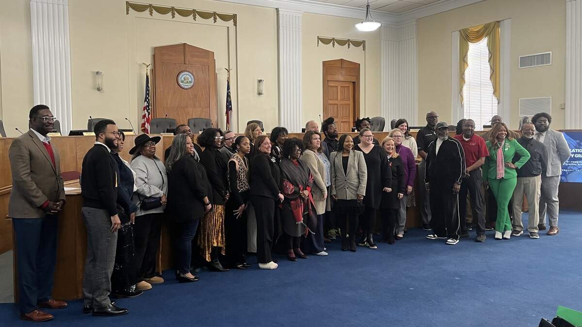 Members of 16 Middle Georgia organizations posed for a photo after Macon Violence Prevention announced it would give them $400,000 in grants on Thursday, Jan. 15, 2026, at Macon-Bibb City Hall.