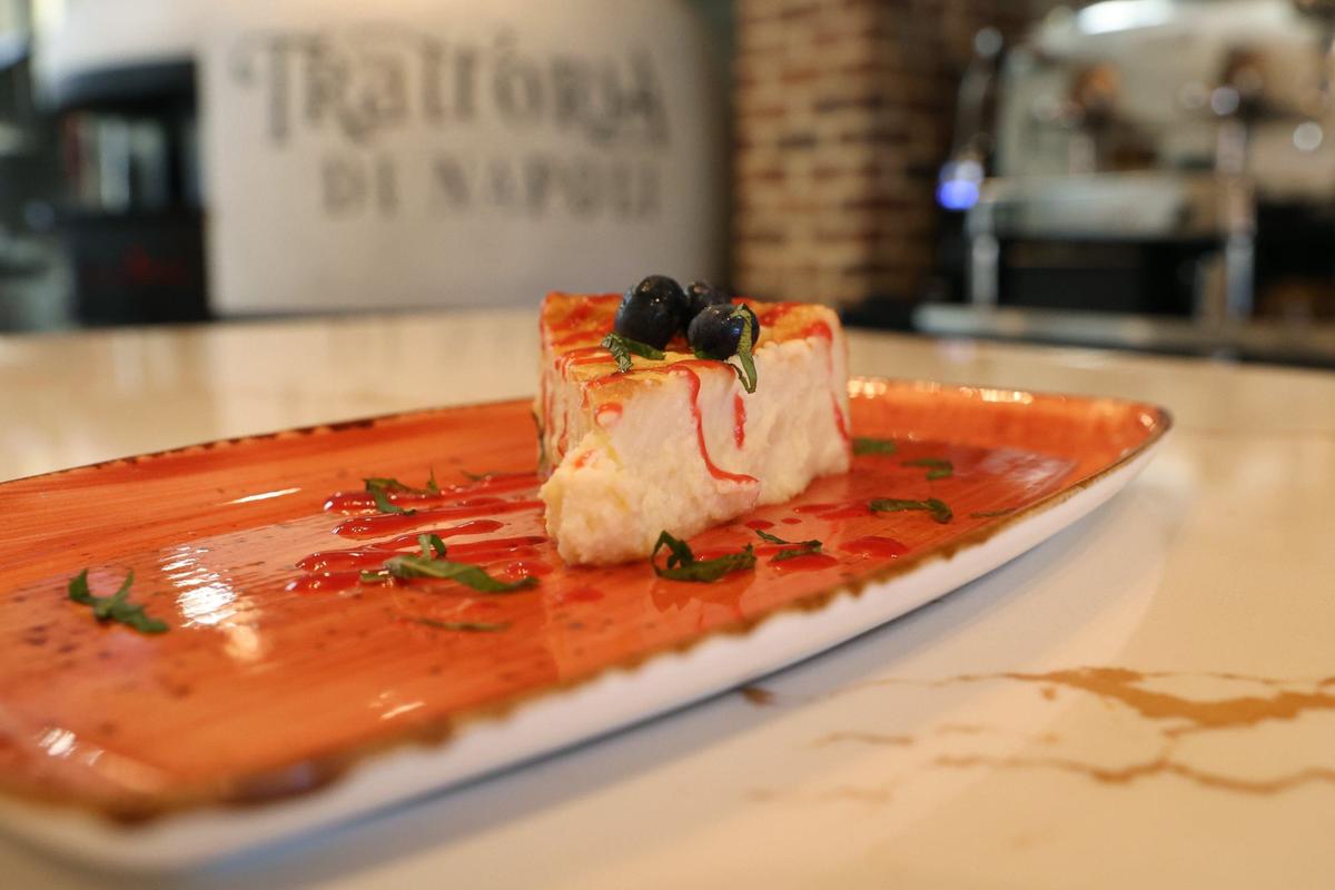 Trattoria di Napoli’s ricotta based cheesecake sits on a counter of the restaurant on Wednesday, Aug. 7, 2024, in downtown Perry, Georgia. Proprietor John Staurulakis has worked in the restaurant industry for most of his life, but soon will open Trattoria di Napoli as his first restaurant.