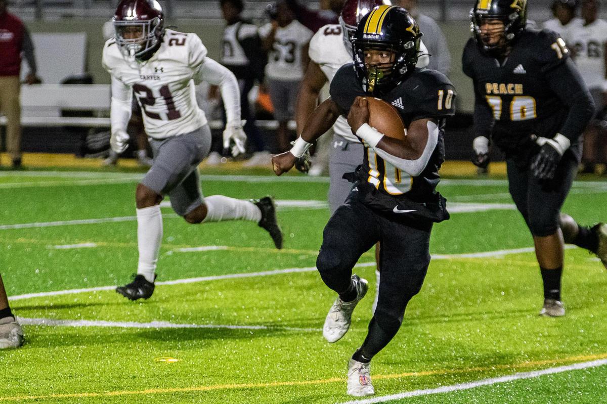 Peach County’s Robert Jones looks for running room against Carver Thursday night.