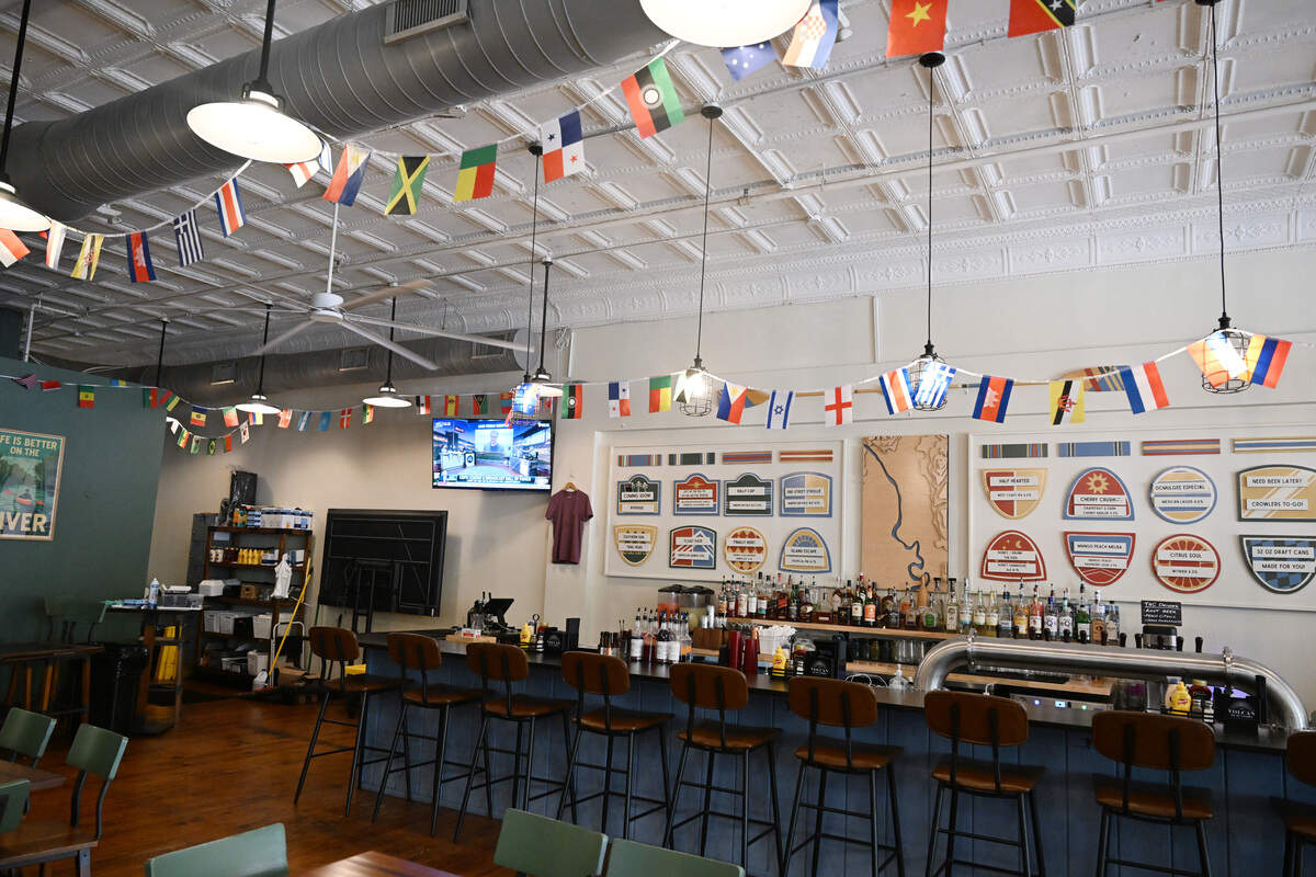 International flag garlands hang inside of Ocmulgee Brewpub ahead of the FIFA World Cup on Monday, June 8, 2026, in Macon, Georgia. Ocmulgee Brewpub is offering specialty menu items and a new crafted beer to celebrate the FIFA World Cup this summer.