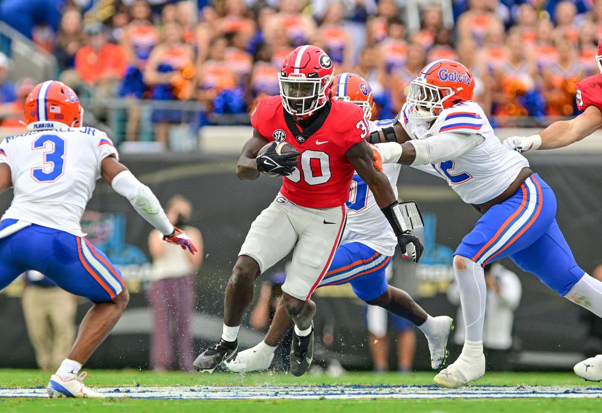 Georgia running back Daijun Edwards finds a gap in the Floida defensive line Saturday as the Dawgs beat Florida 42-20.