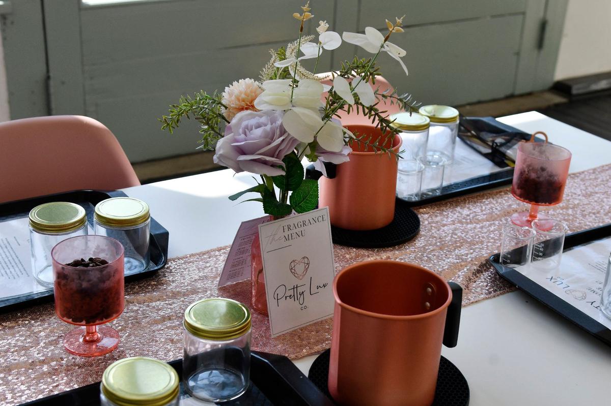 Candle making kits sit on a table in Pretty Luxe Co. off of 3rd Street on Friday, May 31, 2024, in downtown Macon, Georgia. Pretty Luxe Co. offers candle making workshops and also sells organic home goods and skin care products.