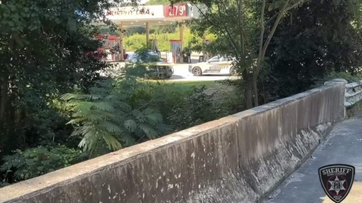 A wooded area was surrounded by crime scene tape and patrol cars of the Bibb County Sheriff’s Office after a shooting happened on Sunday, Aug. 31, 2025, near Murphy USA gas station on Harrison Road in Macon, Ga., according to the sheriff’s office’s Facebook.