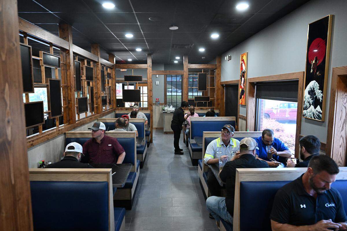 Customers sit in a separated dining area for orders from the kitchen during lunch at new Japanese steakhouse and sushi bar in Perry. Koji also features seating at teppanyaki tables and at a sushi bar.