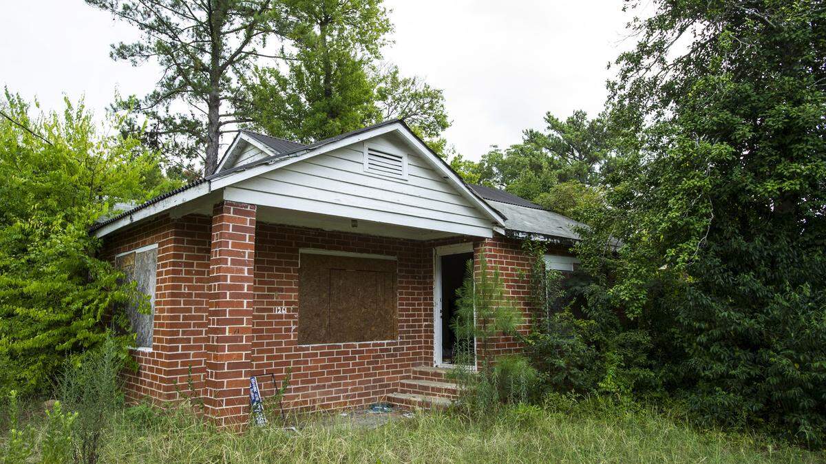 Blight, such as this house at 1261 Hartley St., is an ongoing project for Macon-Bibb County officials.