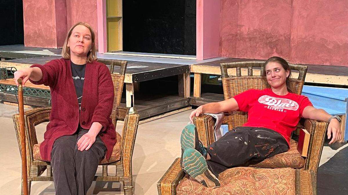 Liane Treiman and Karleigh Woodard rehearse relaxing at an Italian villa for Theatre Macon’s coming production of “Enchanted April.” It begins March 18.