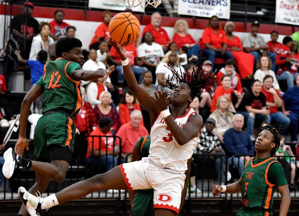Dodge County’s Heaven Carson (3) puts up a shot off the glass during the Indians’ 60-41 win over Rutland in the first round of the GHSA playoffs Wednesday.