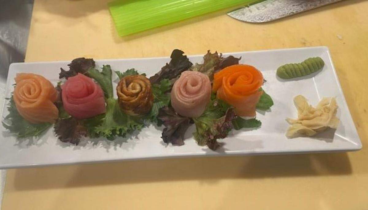From left, fresh salmon, red tuna, eel, Hamachi (yellowtail) and smoked salmon sashimi.