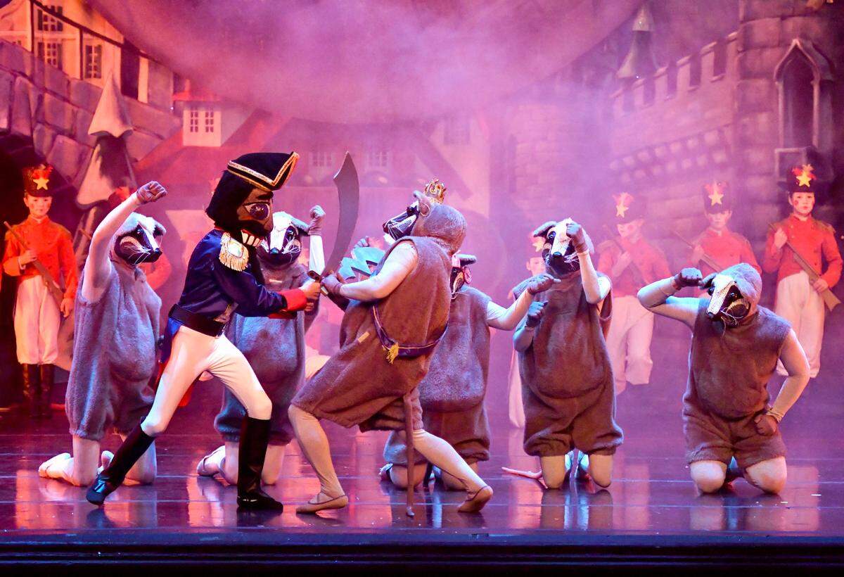 Donn Rodenroth as the “Rat King” and Aiden Wells as the “Nutcracker” battle during the Nutcracker of Middle Georgia during a school performance Thursday morning at The Grand Opera House.