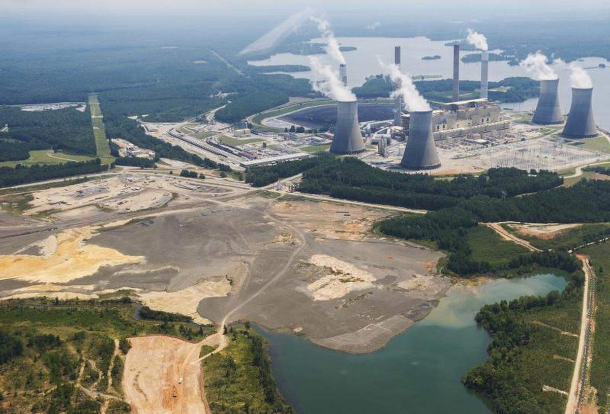 A coal ash pond shown in the foreground at Georgia Power’s Plant Scherer near Juliette.