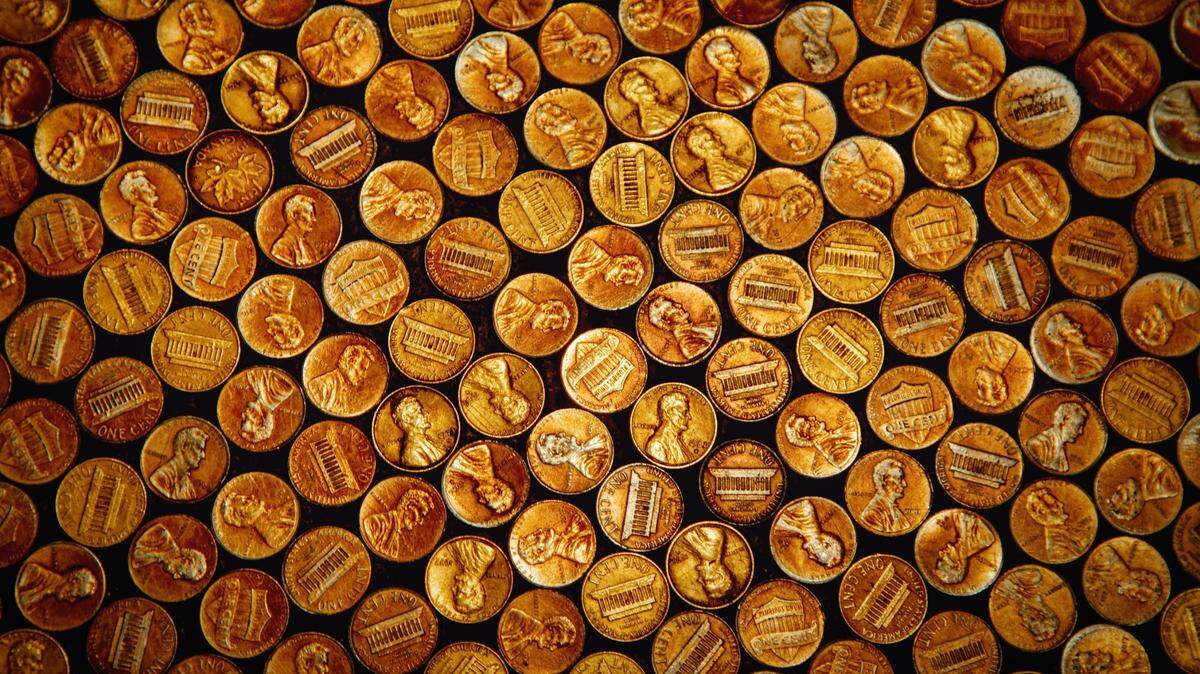 A Georgia auto shop owner paid his employee in oily pennies after the worker complained about not getting his final paycheck, officials say.