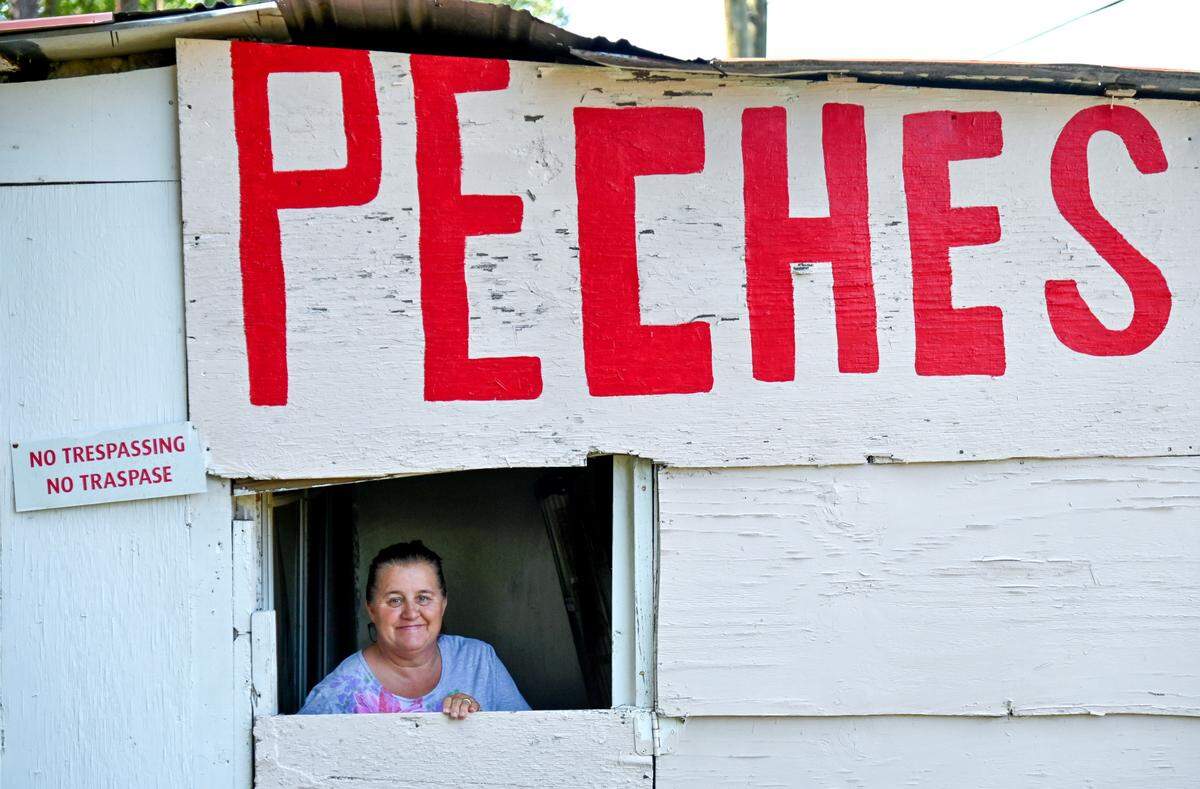 Cindy Jenkins, co-owner of Peches Fruit Stand on U.S. Highway 441 north of Eatonton.