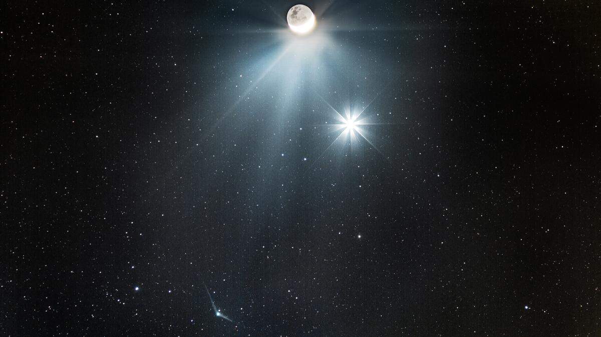 Greg Hogan of Houston County made this photo of the moon, top, the planet Venus, middle right, and the comet Catalina, bottom center left, on Dec. 7. The photo was featured on the NASA Astronomical Photo of the Day website.