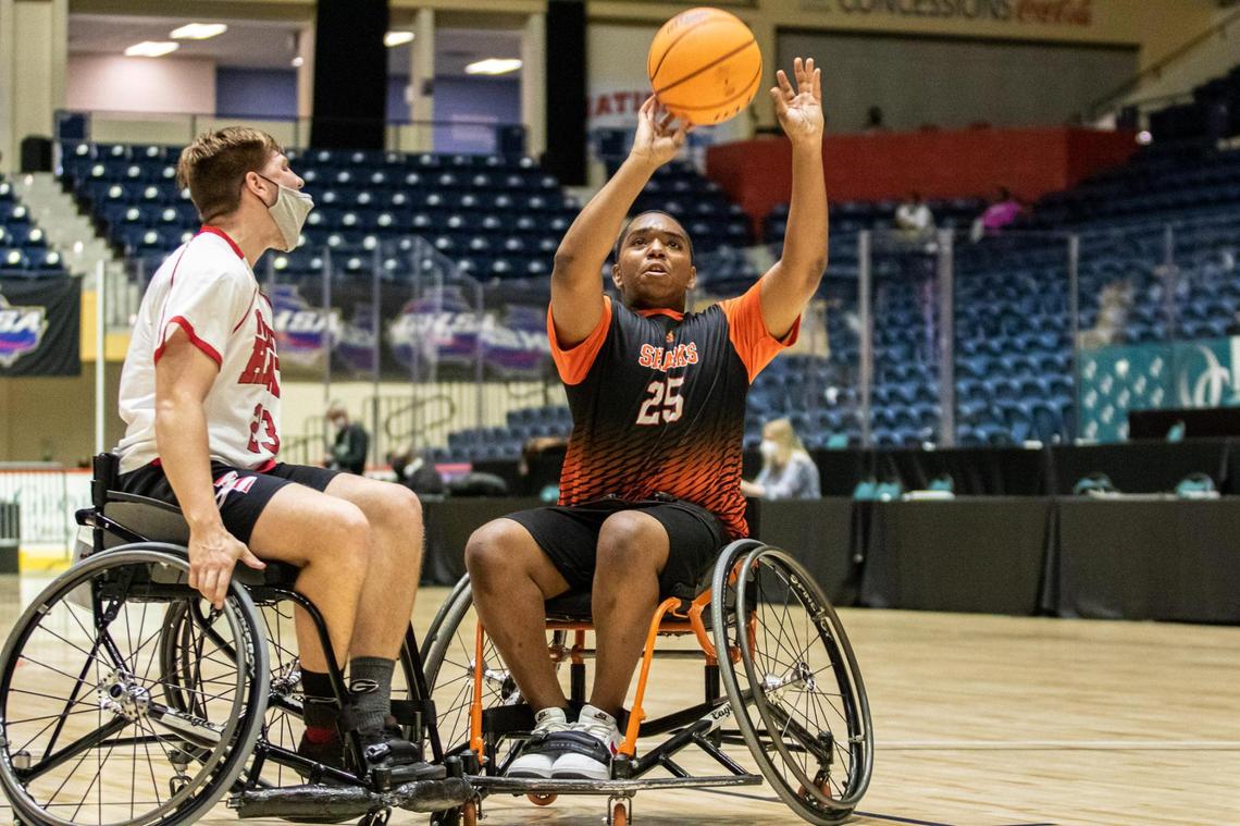 Houston County’s Adonis Brown (25) shoots against the Gwinnett Heat in the GHSA Championship March 13.