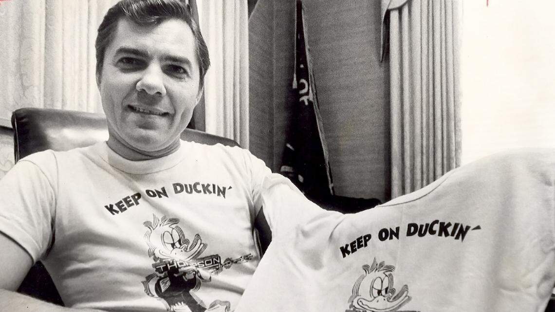 Telegraph file photo - Then-Macon Mayor “Machine Gun” Ronnie Thompson holds up a T-shirt that reads, “Keep on duckin’.”