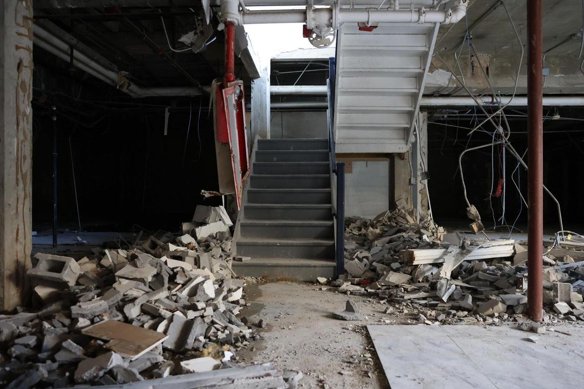 Debris sits around a staircase in the basement of the abandoned Ramada Hotel on Thursday, Dec. 12, 2024, on Thursday, Dec. 12, 2024 in downtown Macon, Georgia. Construction crews are preparing the 16-story hotel for a controlled implosion on New Year’s Day at 9 a.m.