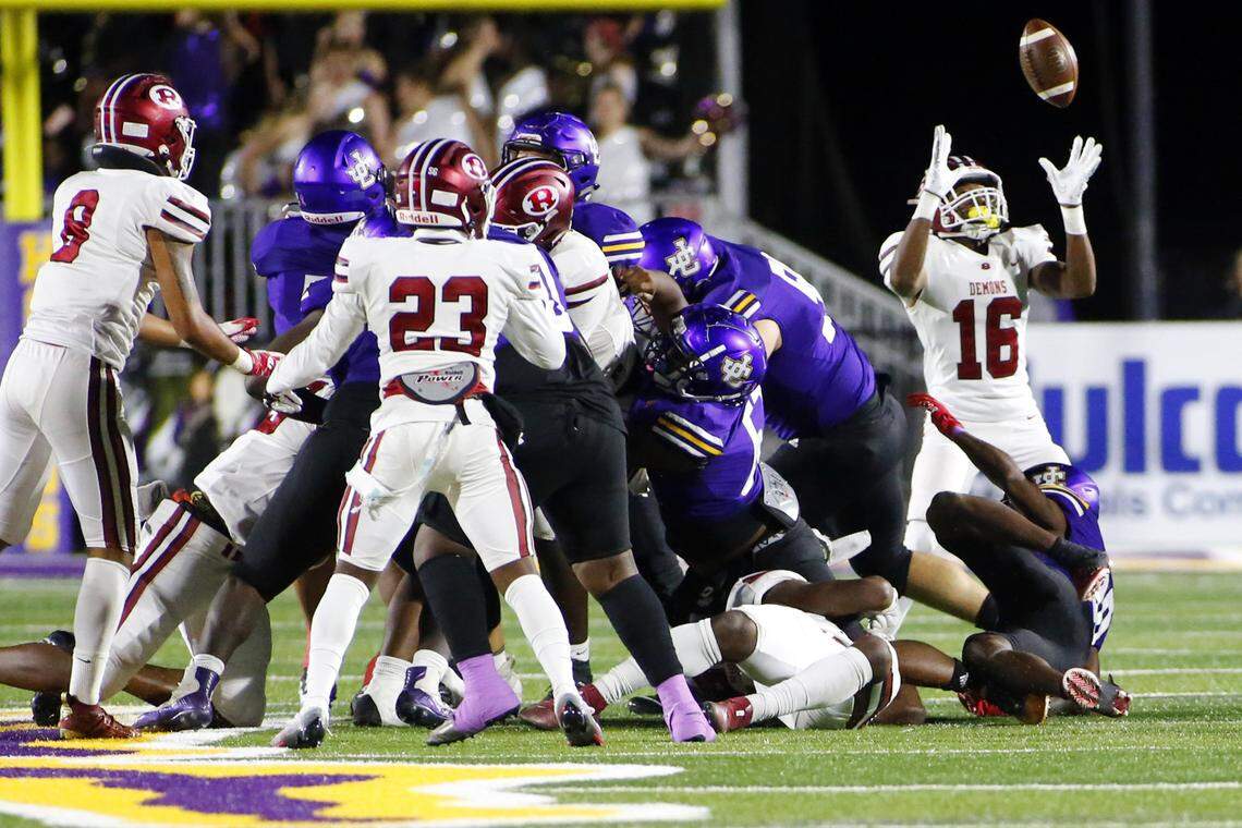 Warner Robins’ Rasean Dinkins (16) plucks a loose ball out of the air and takes it in for a touchdown during the Demons’ game at Jones County.