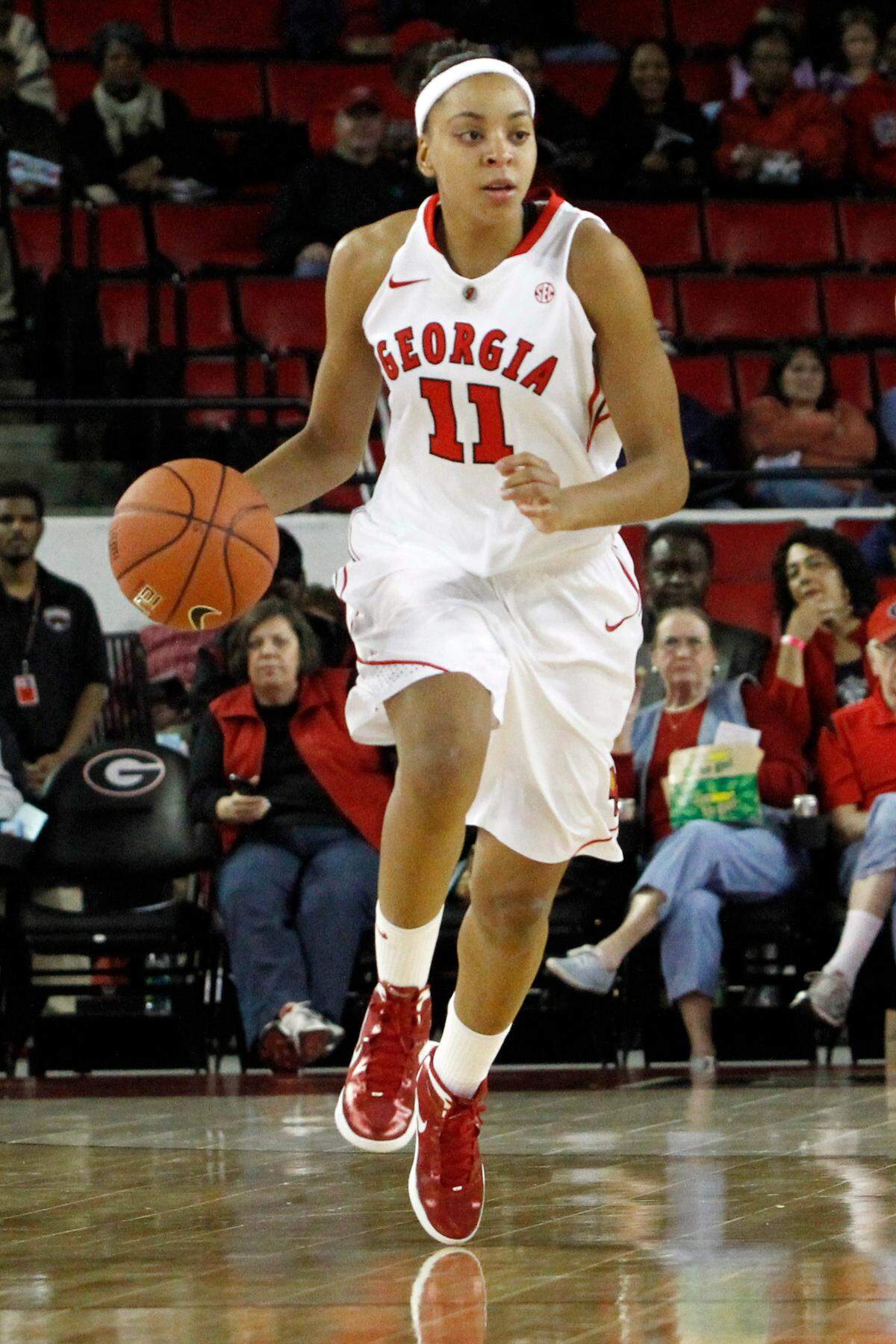 Meredith Mitchell faces an opponent during her 2011-2012 season. Mitchell is currently in her sixth year as director of basketball operations for the Lady Bulldogs.