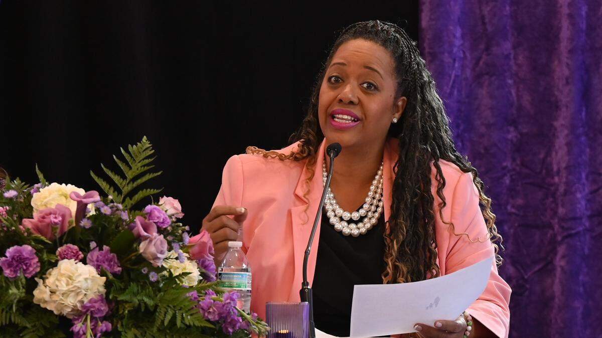Georgia Legal Services deputy director Tomieka Daniel speaks on a panel on myths around domestic violence during the Annual Domestic Violence Awareness Symposium hosted by Macon Judicial Circuit District Attorney Anita Howard on Wednesday, Oct. 29, 2025, at Oval Hall at Wesleyan College in Macon, Georgia. The symposium discussed the complicated process to get adequate help, as well as gaps in care for domestic violence victims. 