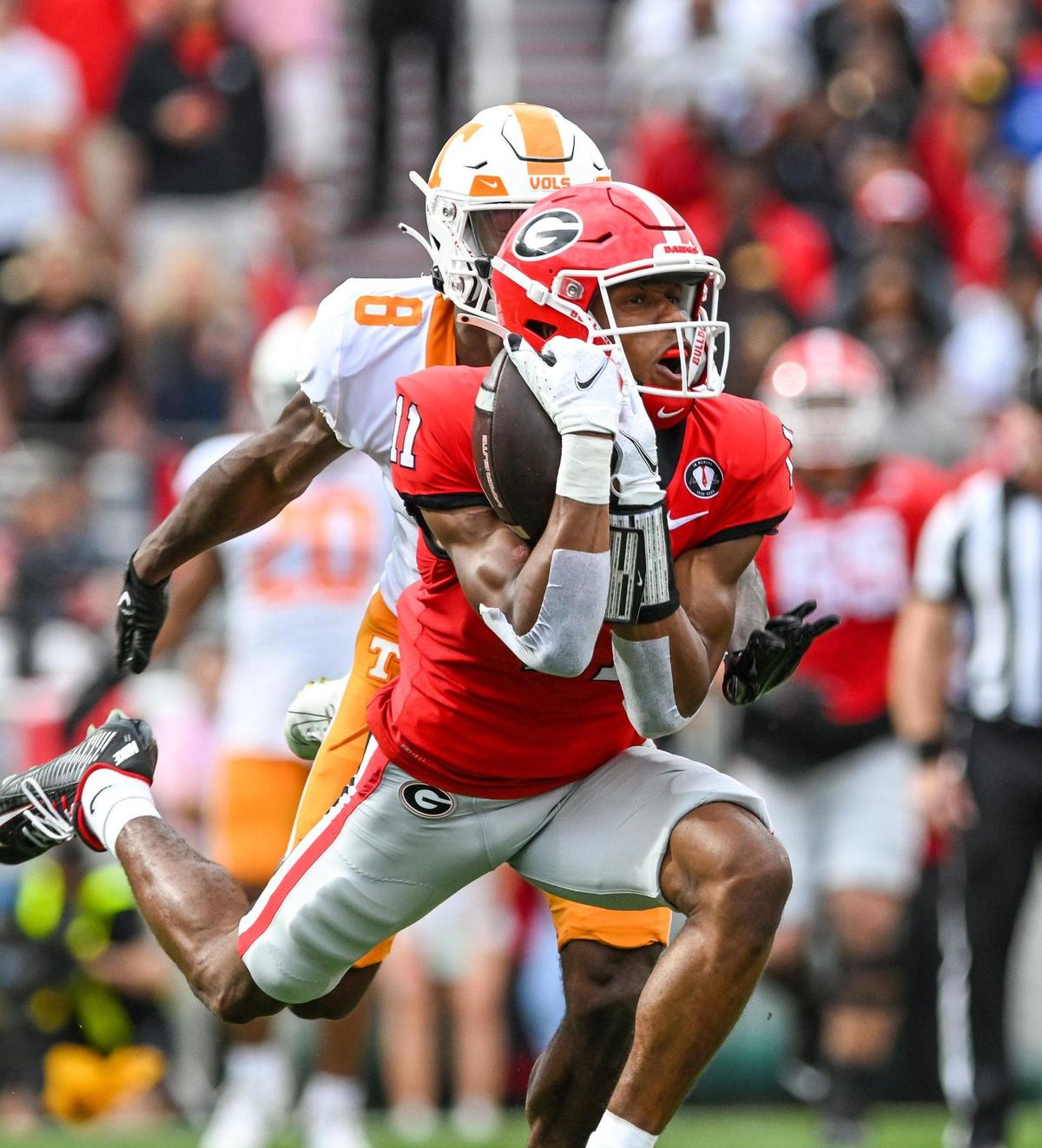 Georgia wide receiver Arian Smith hauls in a Stetson Bennett pass in action Saturday as the Bulldogs beat Tennessee 27-13.
